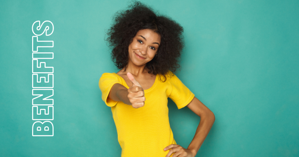 Lady in a yellow t-shirt doing a thumbs up